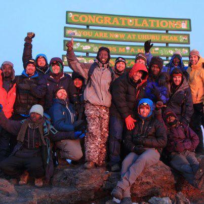 Colorado Mountain College students and their guides on the summit of Mt. Kilimanjaro.