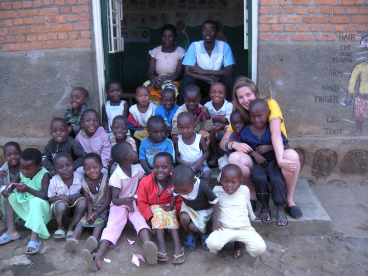 Former CMC student Jasmine Marchman with children at an orphanage in Rwanda during a 2012 Study Abroad trip to Rwanda.